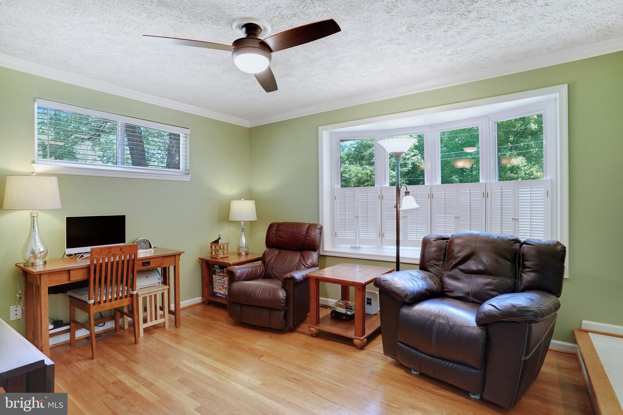 5300 Kings Park Drive Springfield, VA 22151 - Photo 21 of 62 a living room with furniture ceiling fan and a window