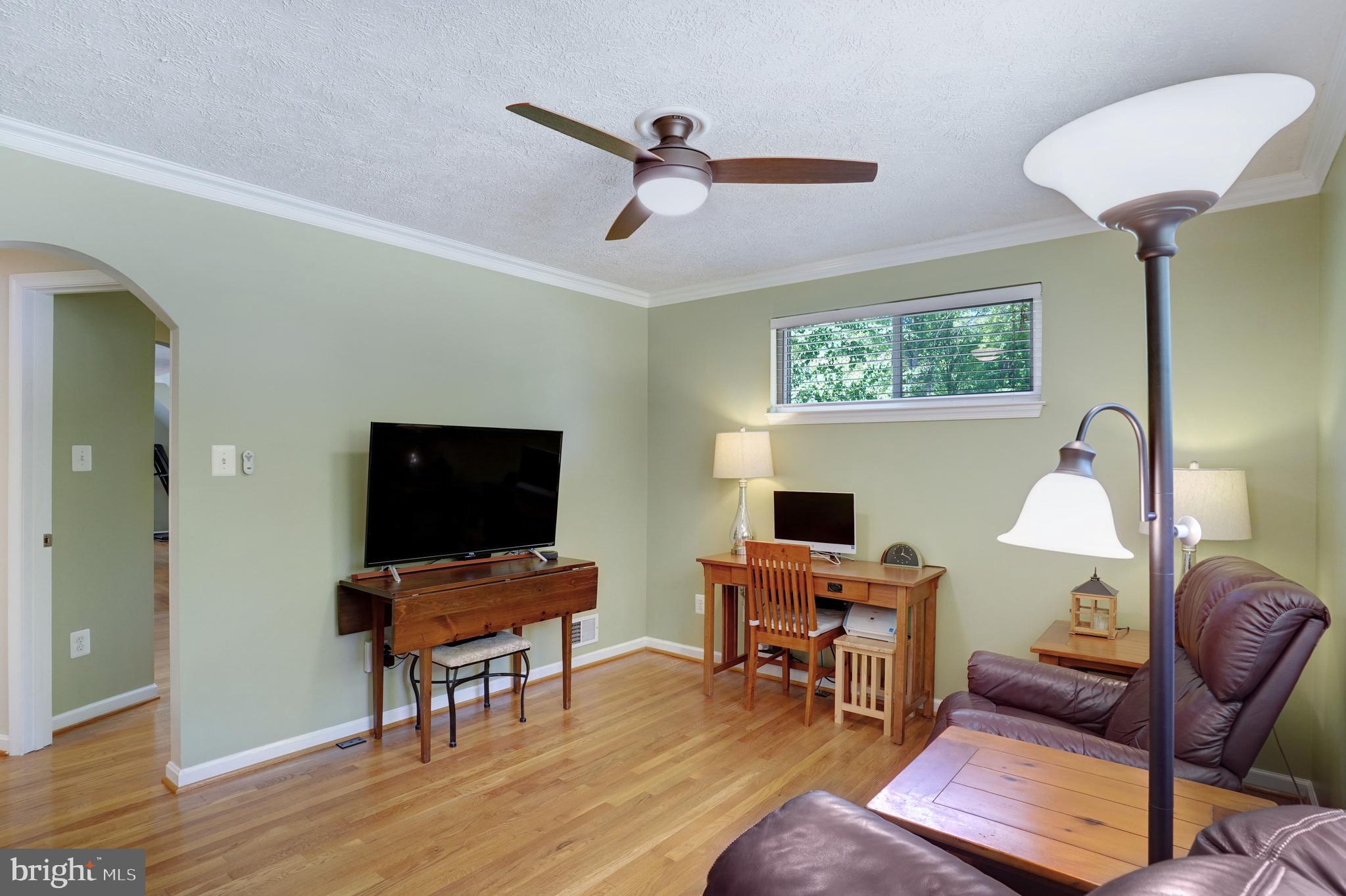 5300 Kings Park Drive Springfield, VA 22151 - Photo 22 of 62 a view of a livingroom with workspace and a window
