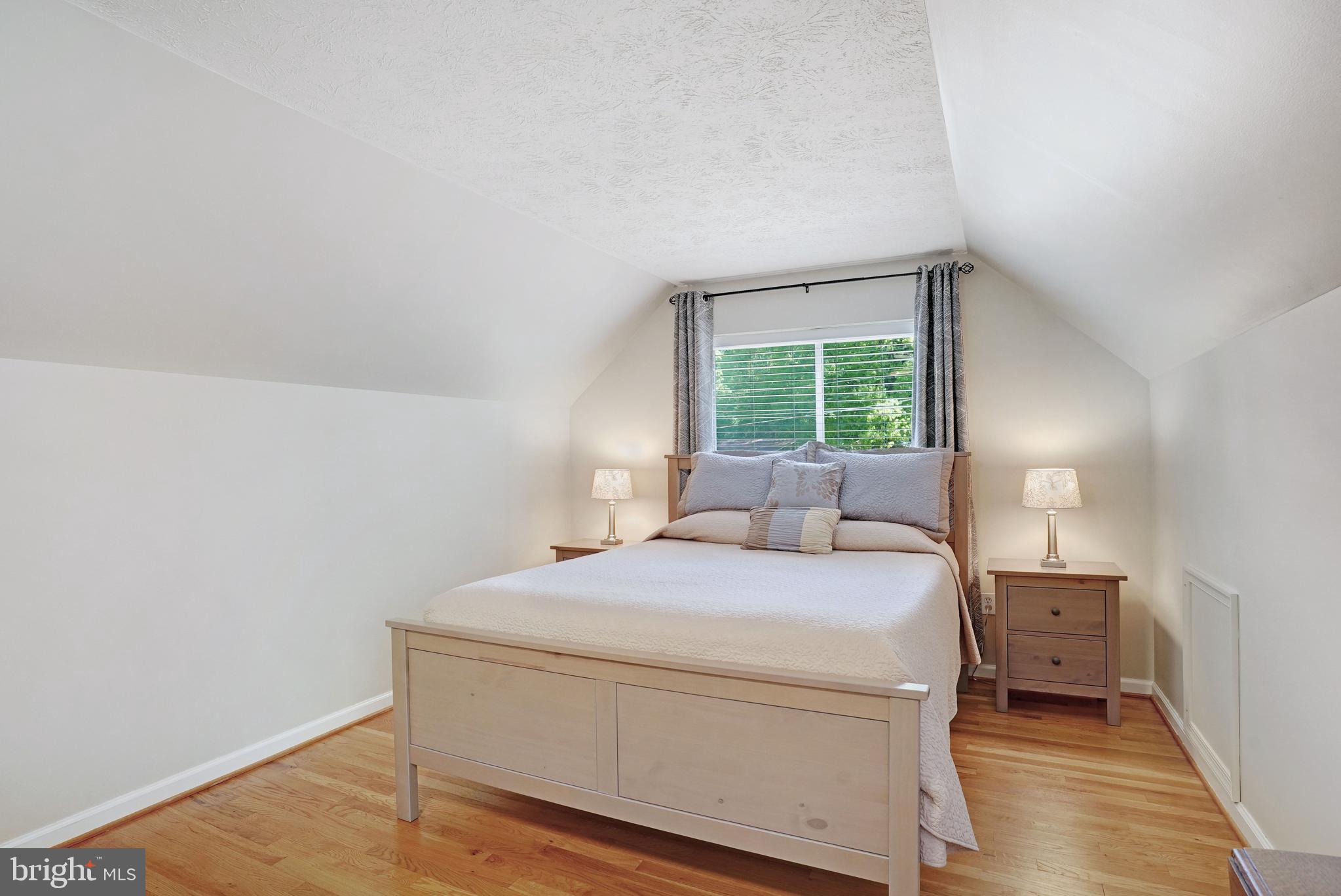 5300 Kings Park Drive Springfield, VA 22151 - Photo 40 of 62 a bedroom with a bed and a window