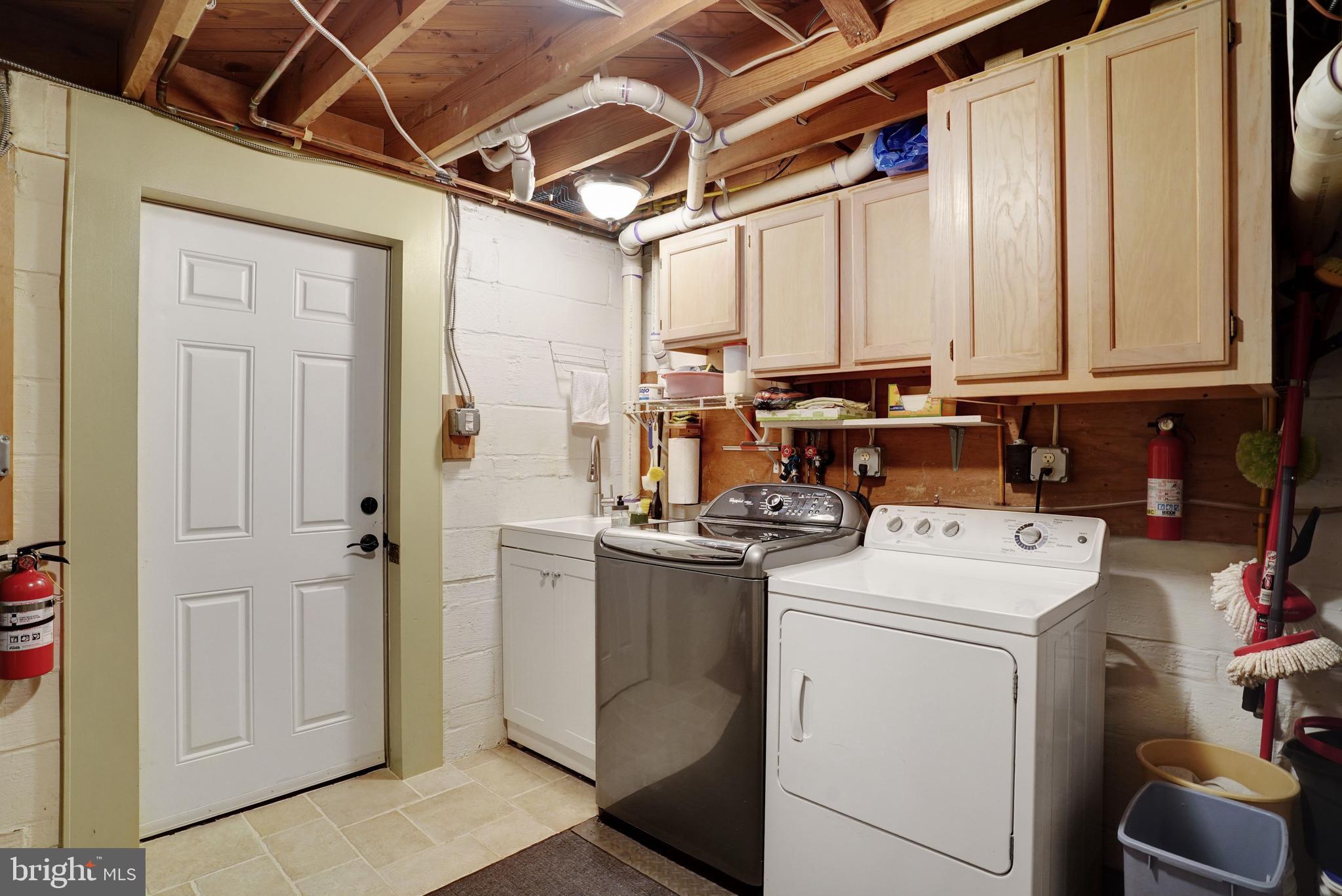 5300 Kings Park Drive Springfield, VA 22151 - Photo 50 of 62 a view of storage and utility room with washer and dryer