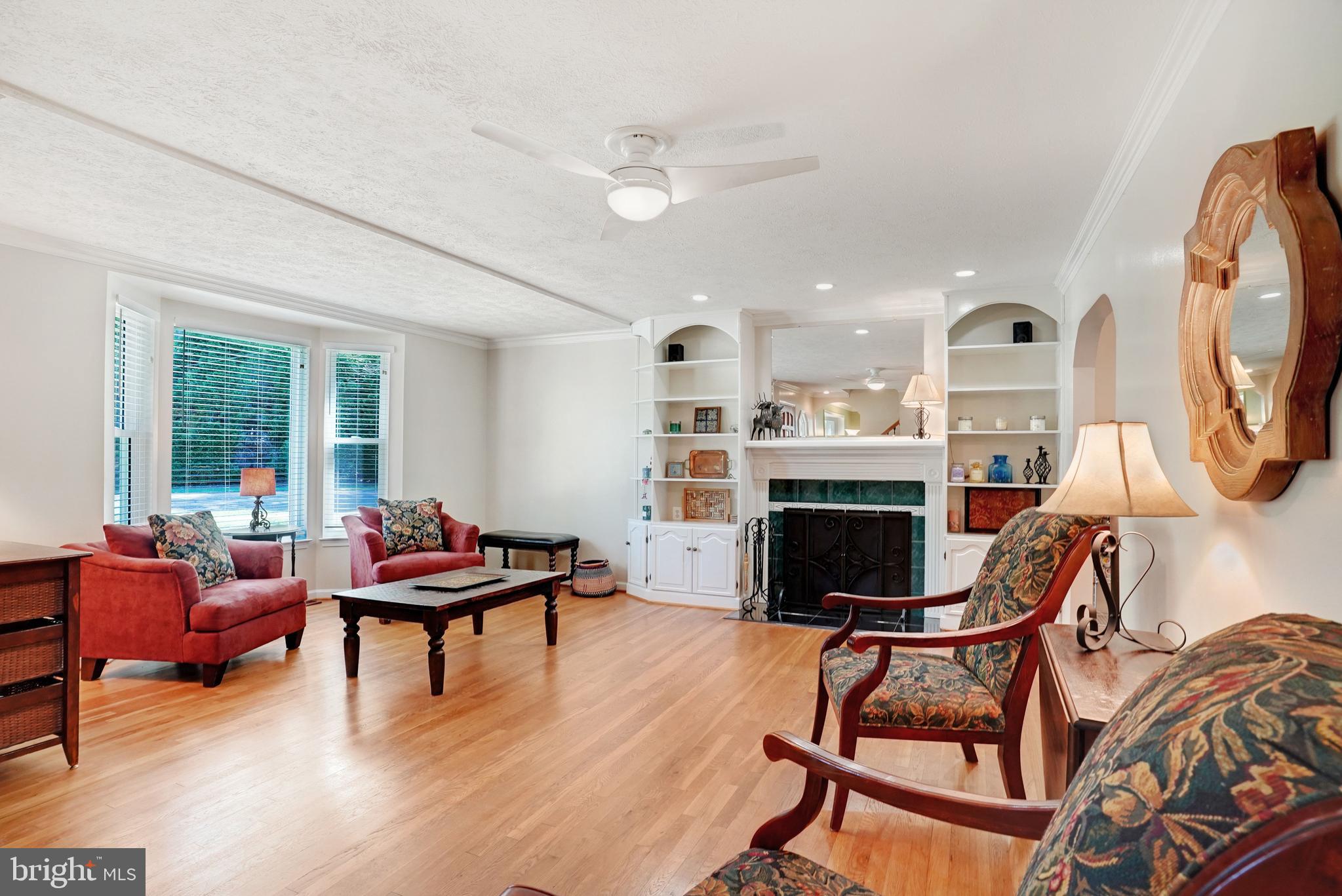 5300 Kings Park Drive Springfield, VA 22151 - Photo 5 of 62 a living room with furniture and a fireplace