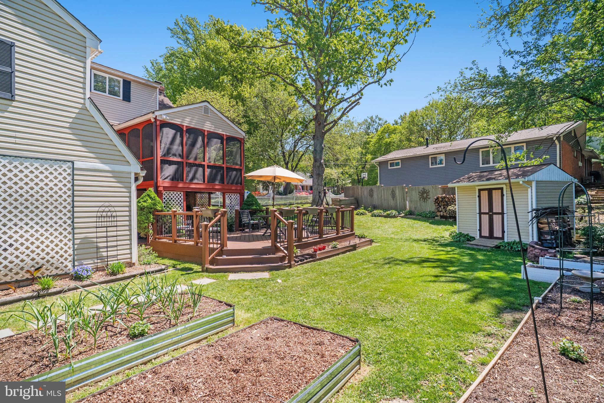 5300 Kings Park Drive Springfield, VA 22151 - Photo 54 of 62 a view of a house with a yard deck and sitting area