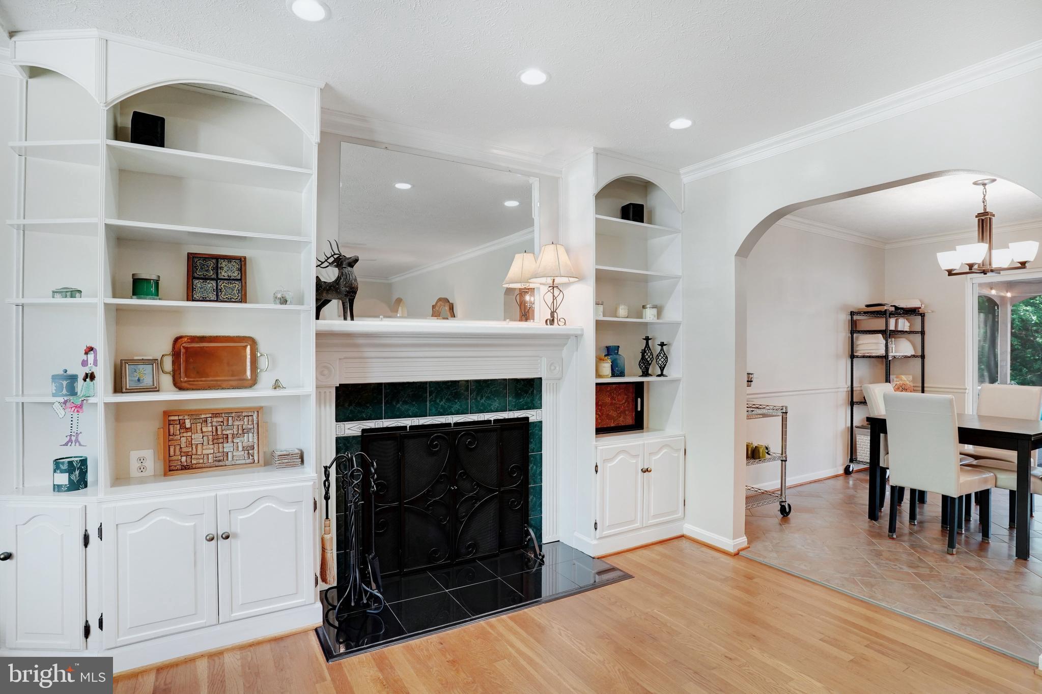 5300 Kings Park Drive Springfield, VA 22151 - Photo 10 of 62 a living room with furniture and a fireplace