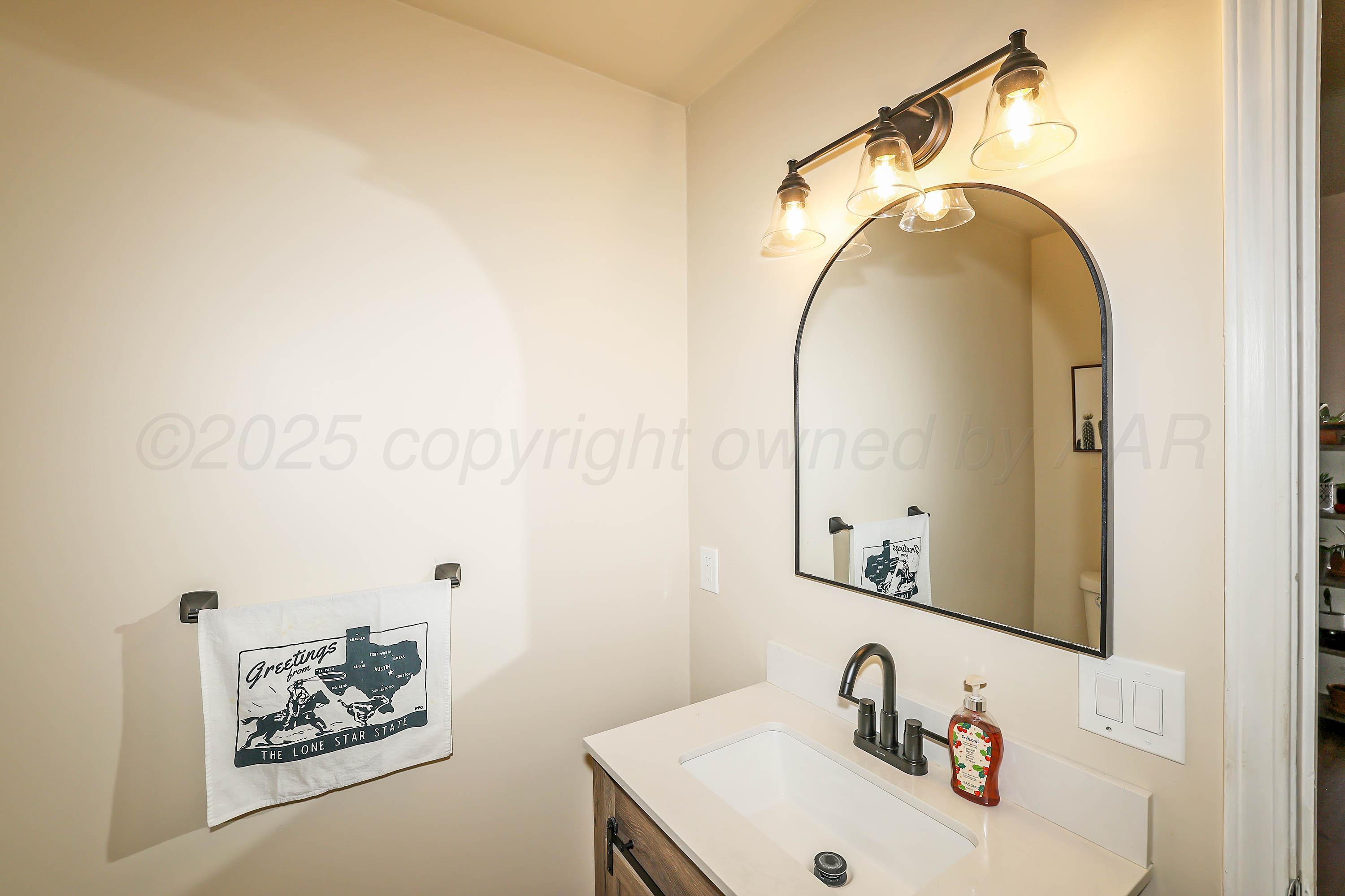 3721 Memory Lane Amarillo, TX 79109 - Photo 15 of 19 18-3rd Bedroom Bath Vanity