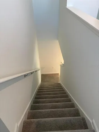 a view of a livingroom with furniture