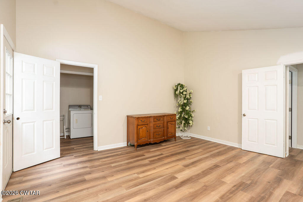 7 Timberlake Drive Jackson, TN 38305 - Photo 17 of 38 a view of a room with wooden floor and closet