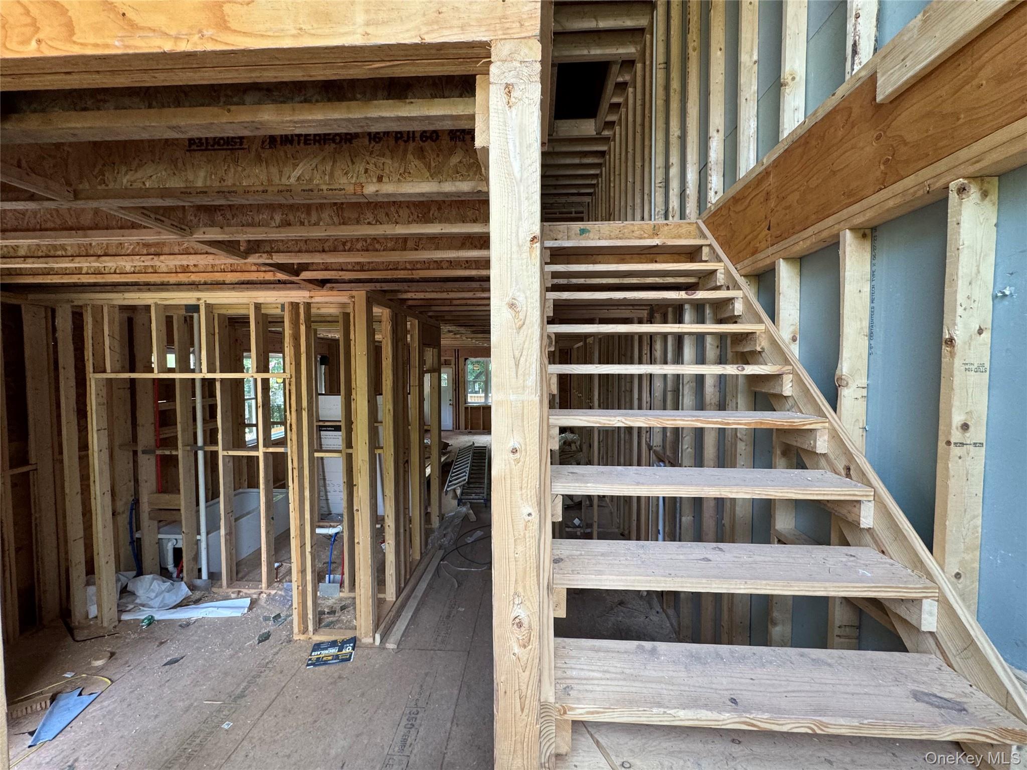 2 St Peters Place Liberty, NY 12754 - Photo 11 of 16 a view of staircase with white walls and windows