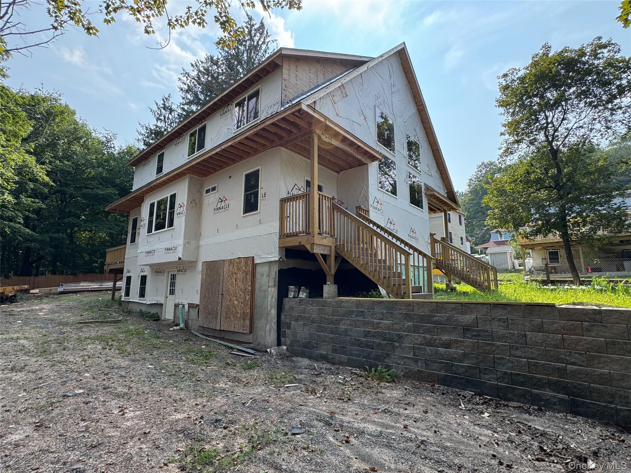 2 St Peters Place Liberty, NY 12754 - Photo 2 of 16 a view of a house with a yard