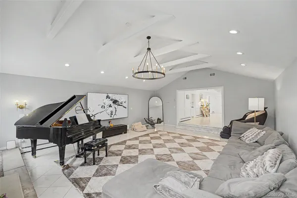 a bed room with a bed mirror and a ceiling fan