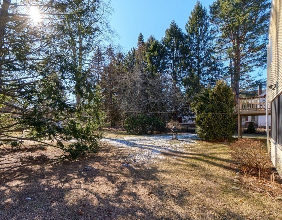 438 Old Bedford Road Concord, MA 01742 - Photo 27 of 31 a view of swimming pool with outdoor seating and trees