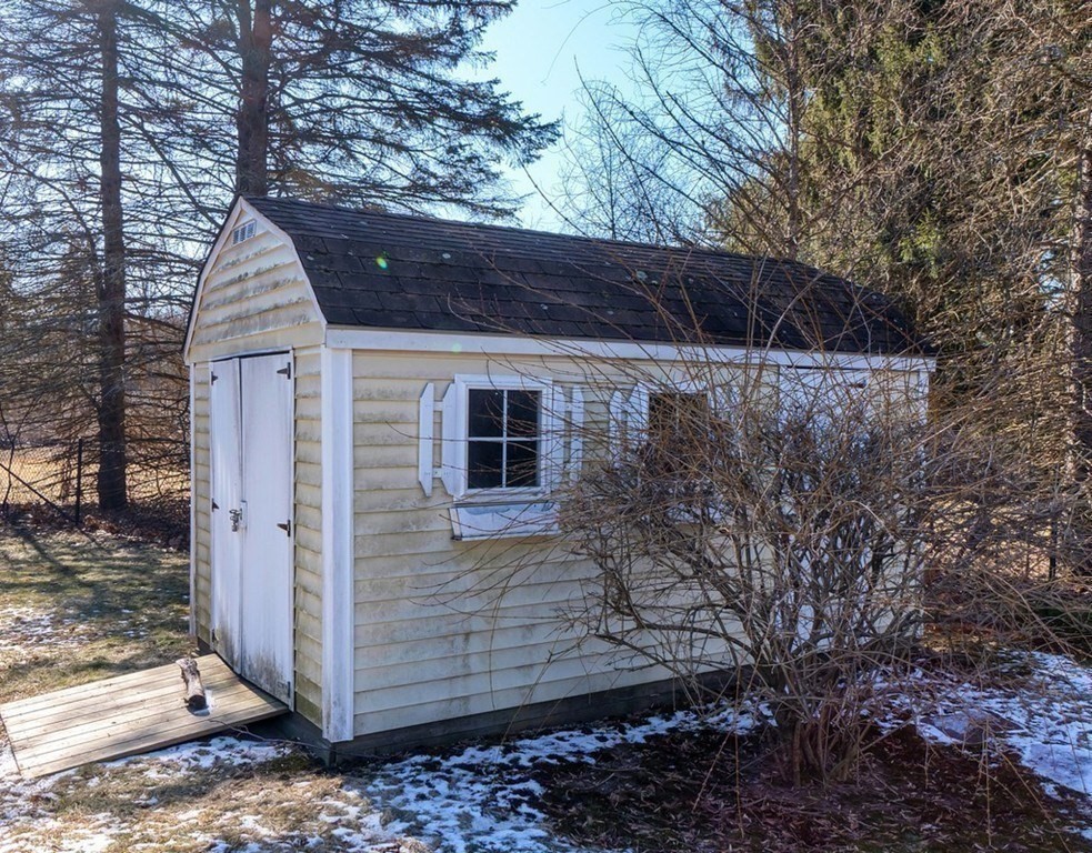 438 Old Bedford Road Concord, MA 01742 - Photo 28 of 31 a view of house with trees in the background