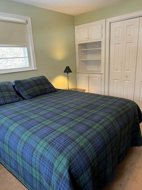 438 Old Bedford Road Concord, MA 01742 - Photo 10 of 31 a bedroom with a bed and a window