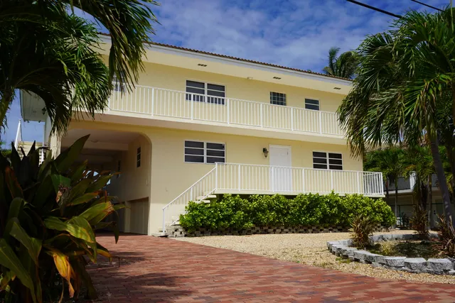 a front view of house with yard