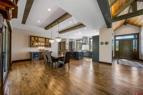 a lobby with furniture and wooden floor