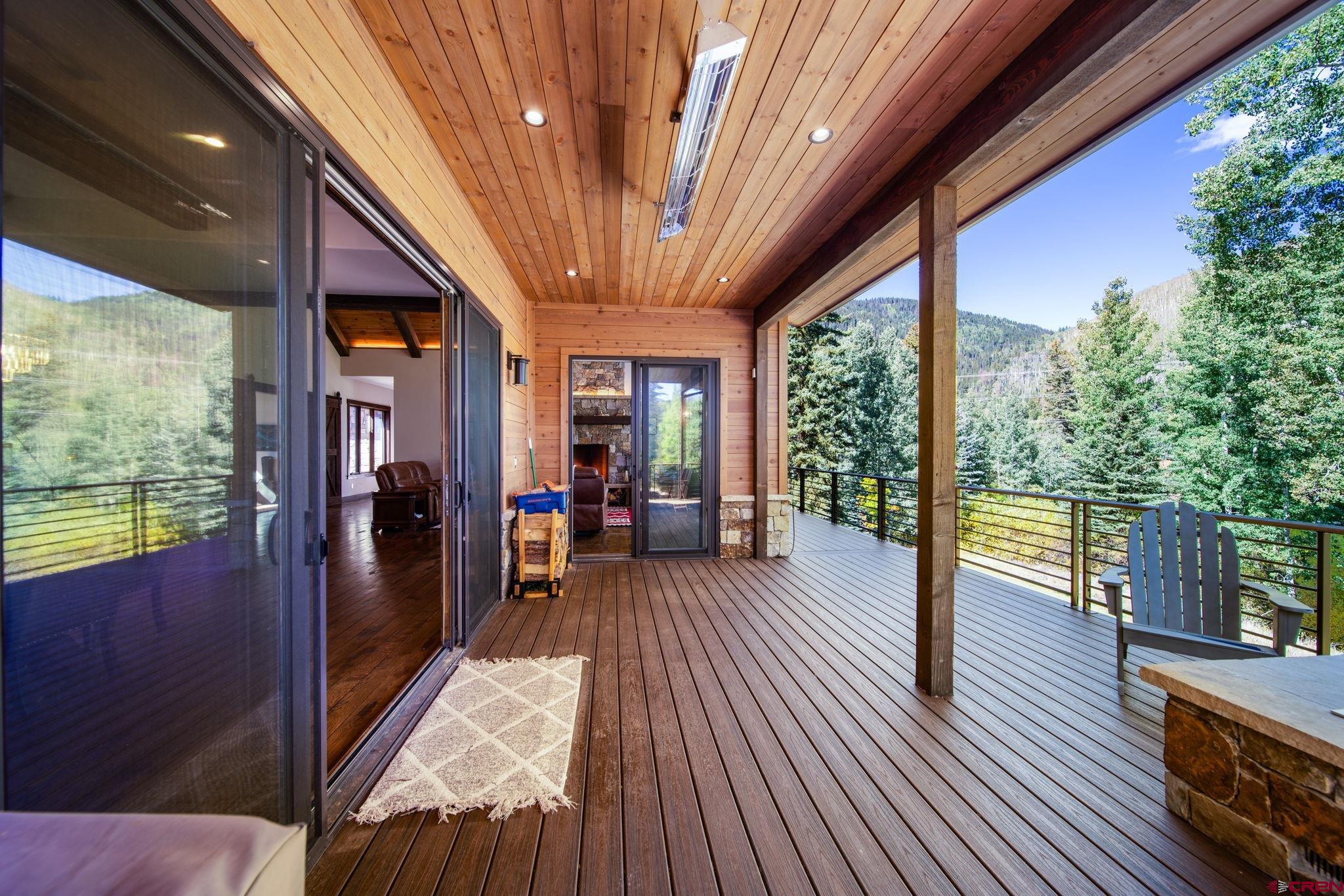 212 2 Dogs Trail Durango, CO 81301 - Photo 19 of 45 a living room with furniture and a large window