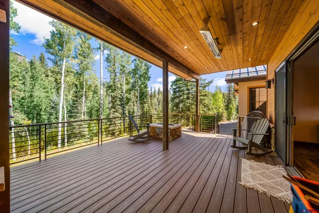 a view of living room with furniture and wooden floor