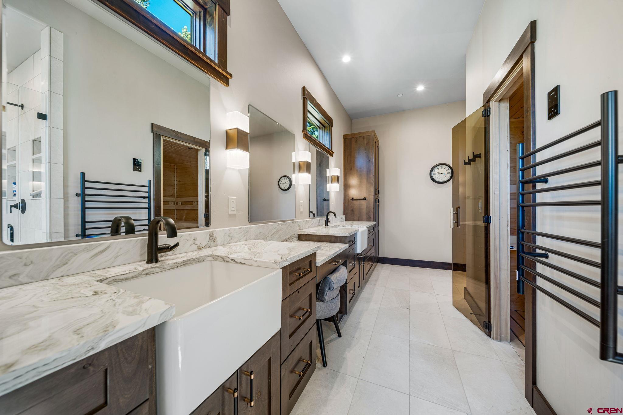 212 2 Dogs Trail Durango, CO 81301 - Photo 31 of 45 a kitchen with a sink and a refrigerator