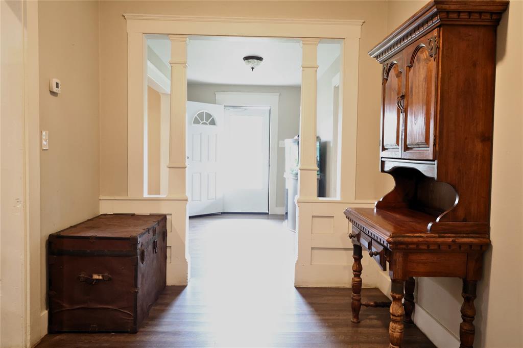 210 Hopkins Street Alba, TX 75410 - Photo 14 of 36 Hall with wood finished floors and baseboards