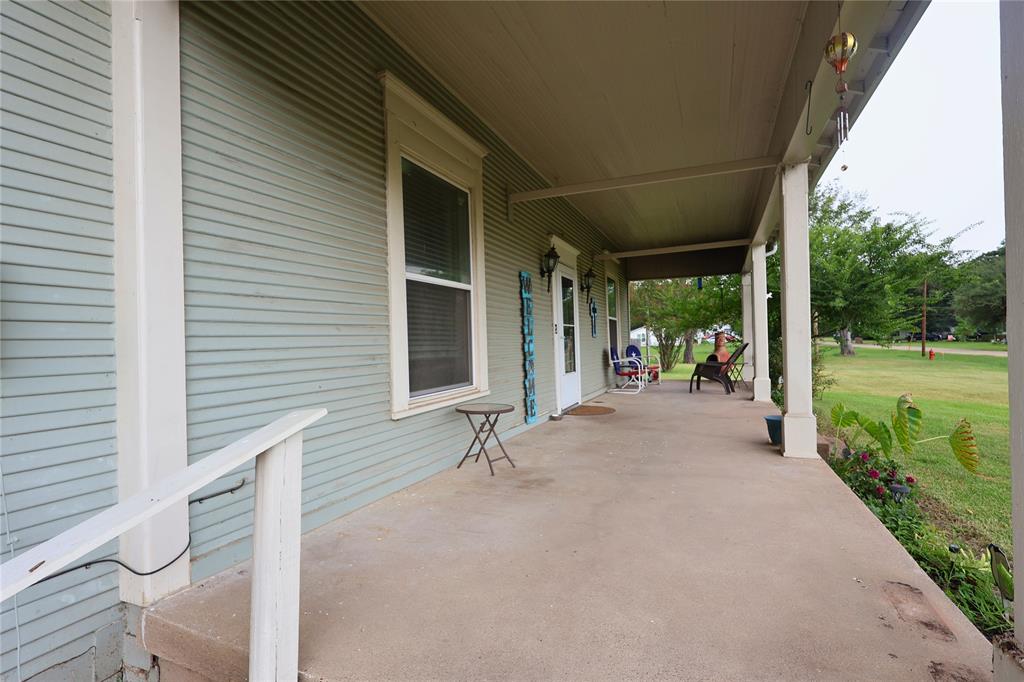 210 Hopkins Street Alba, TX 75410 - Photo 31 of 36 Porch with a yard
