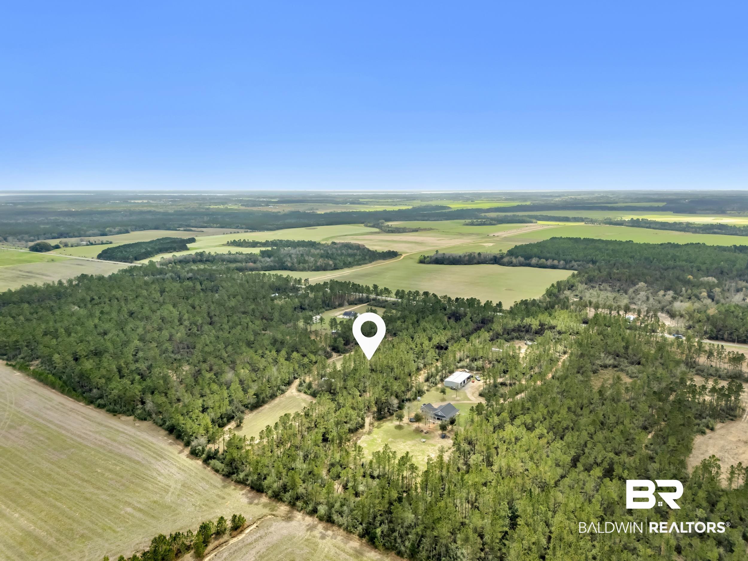 0 Gardner Road Elberta, AL 36530 - Photo 12 of 19 View of rural area with a heavily wooded area and farmland