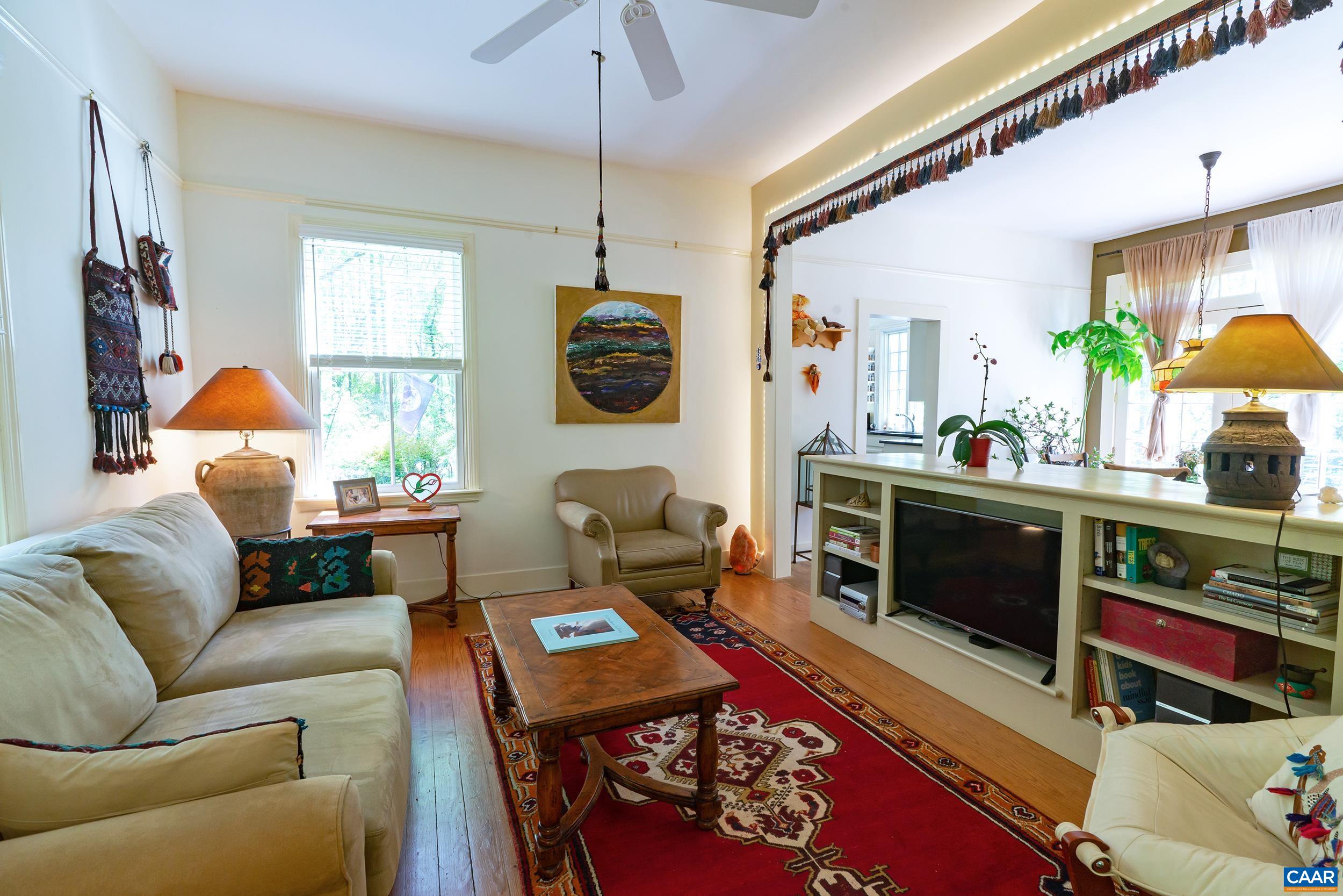 6037 Plank Road Afton, VA 22920 - Photo 38 of 52 a living room with furniture and a flat screen tv
