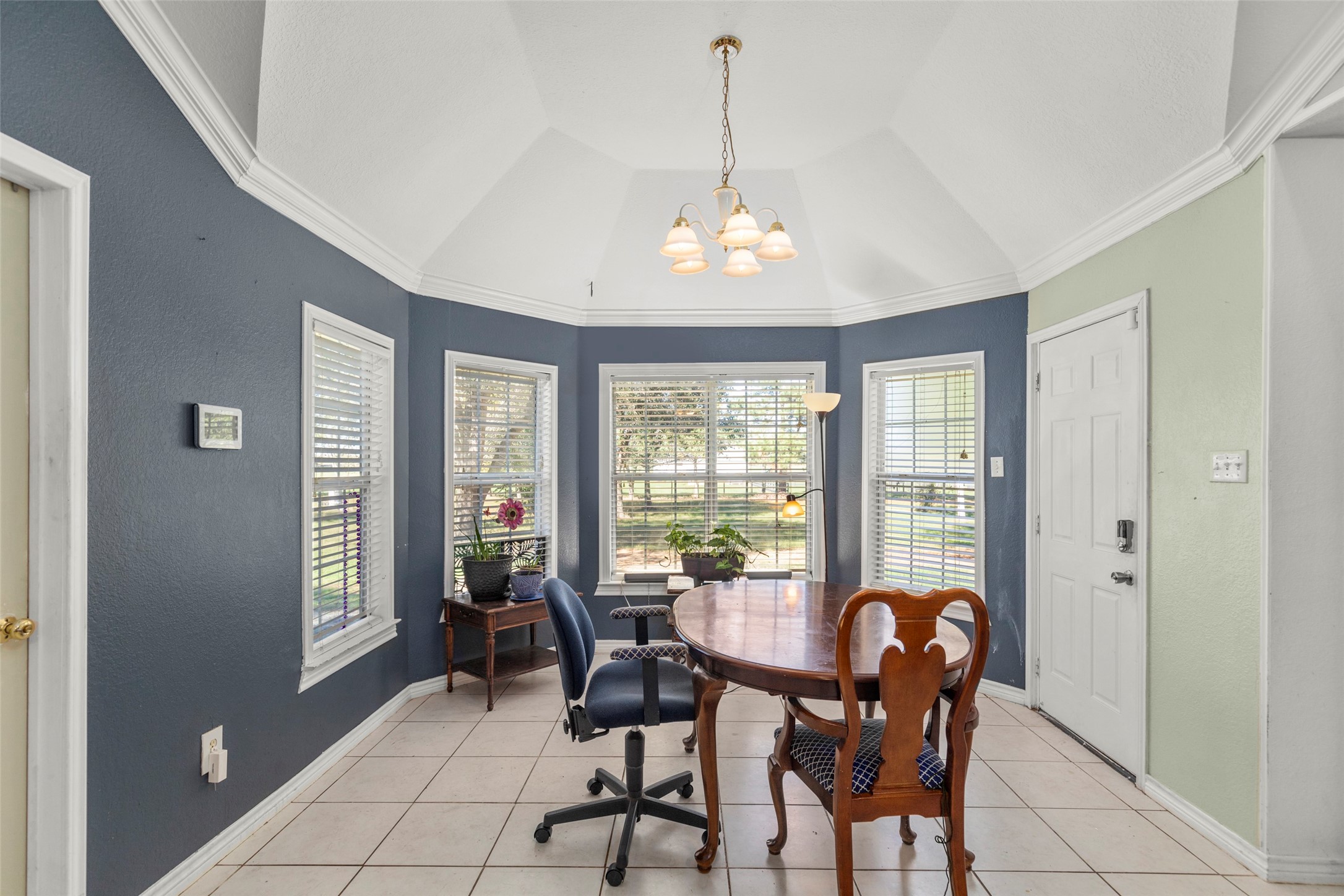 16004 Penick Road Waller, TX 77484 - Photo 19 of 50 a view of a dining room with furniture window and outside view