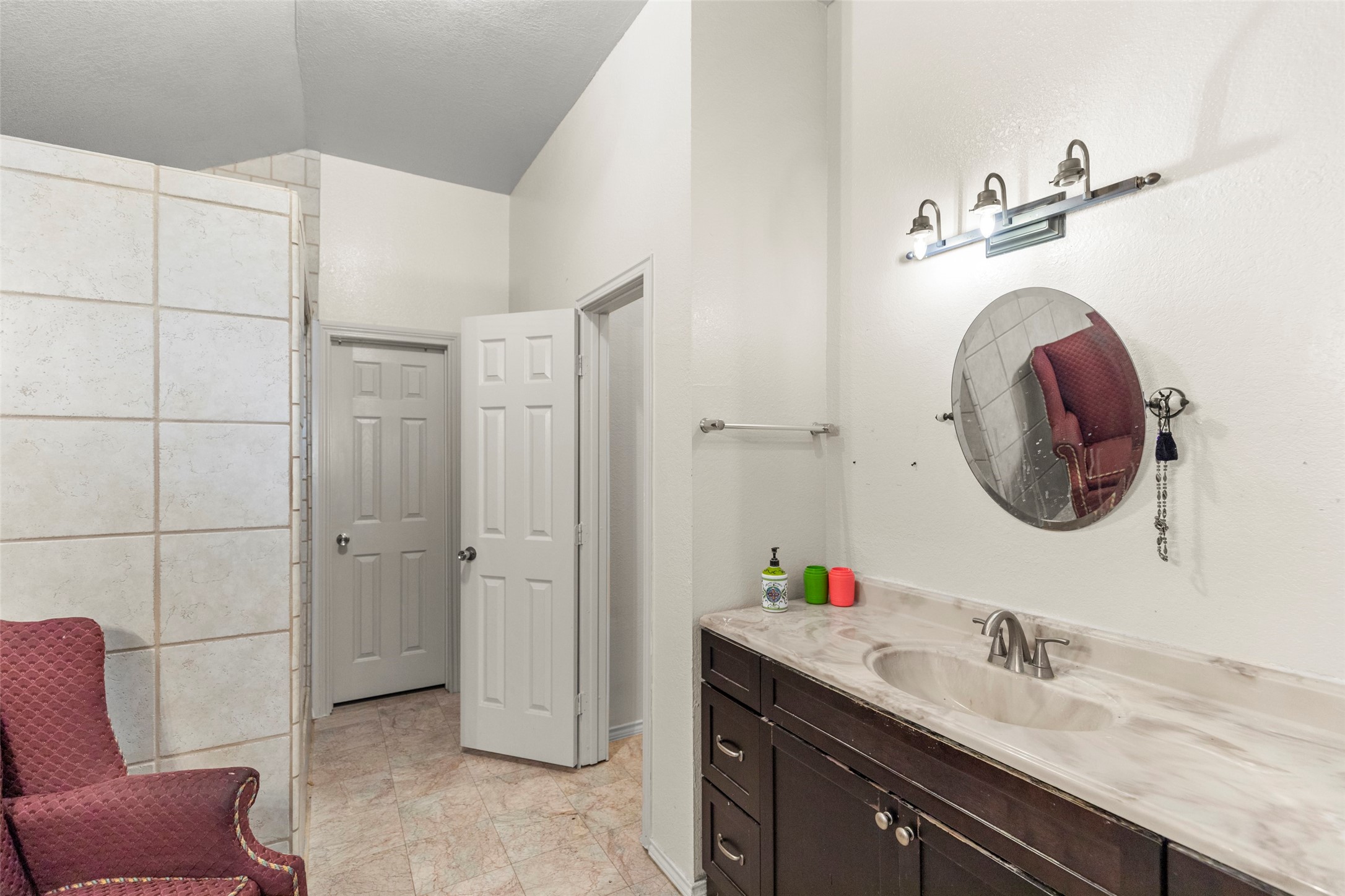 16004 Penick Road Waller, TX 77484 - Photo 21 of 50 a bathroom with a sink and a mirror