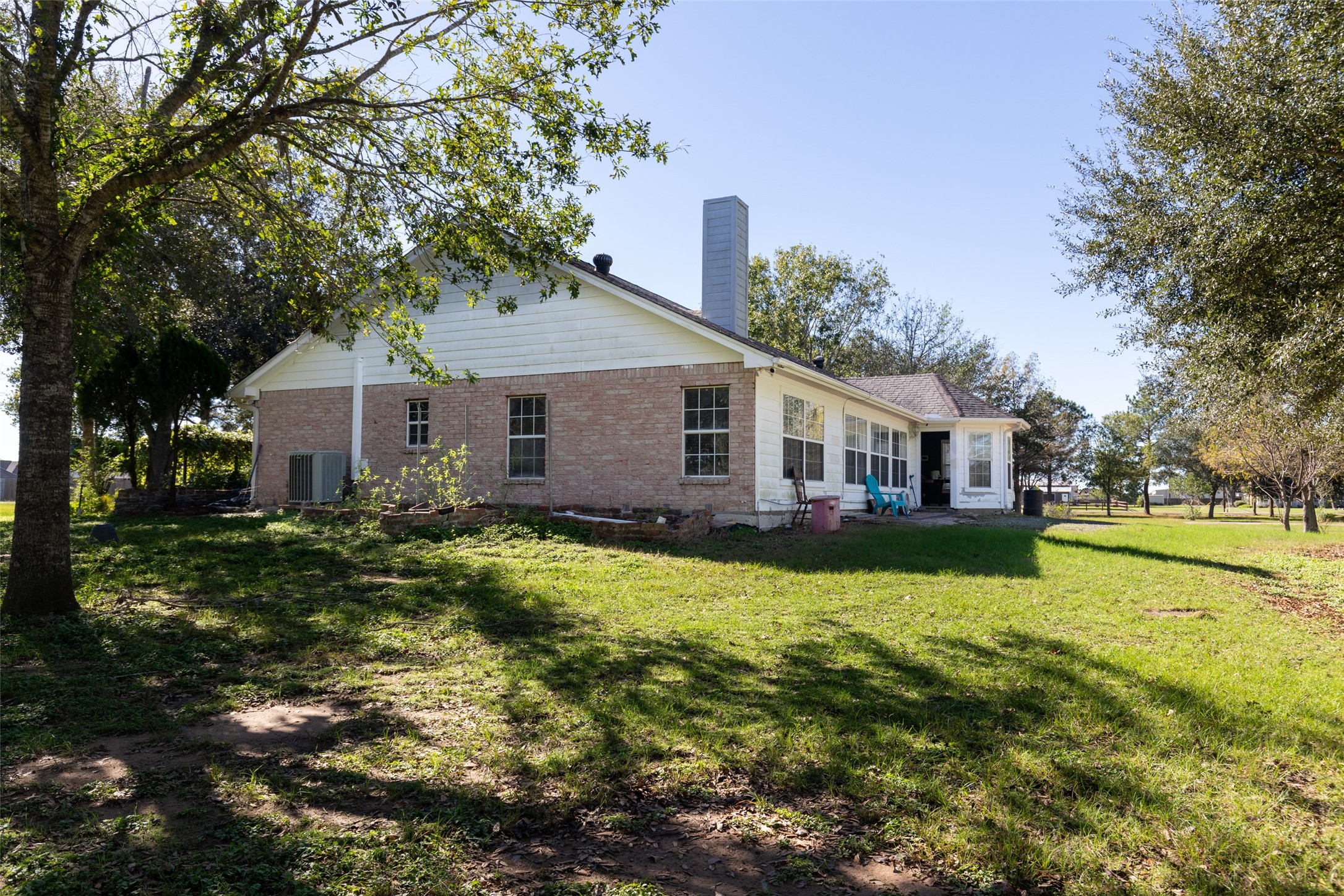 16004 Penick Road Waller, TX 77484 - Photo 32 of 50 a front view of a house with yard and green space