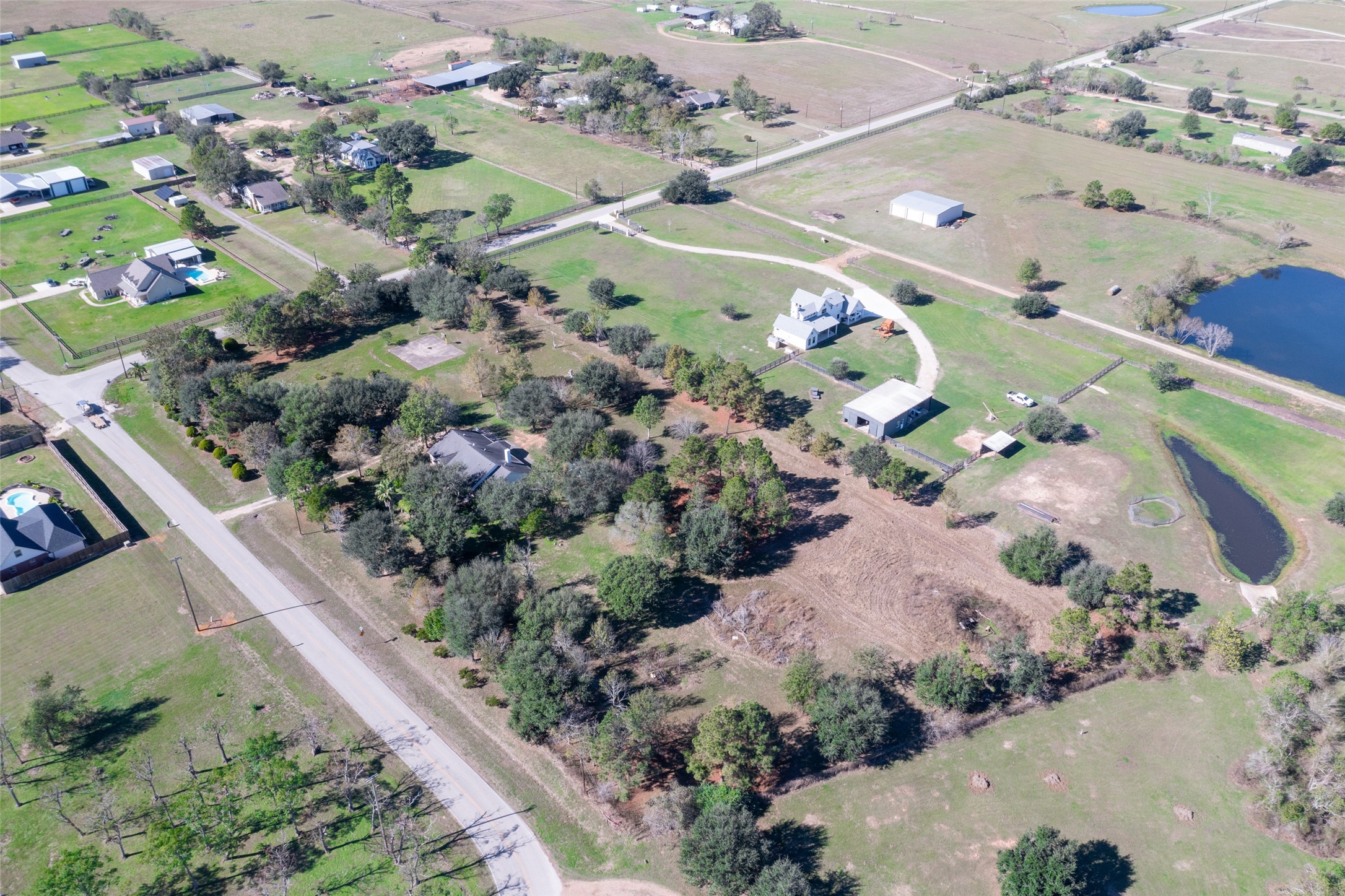 16004 Penick Road Waller, TX 77484 - Photo 48 of 50 a view of a garden with flowers