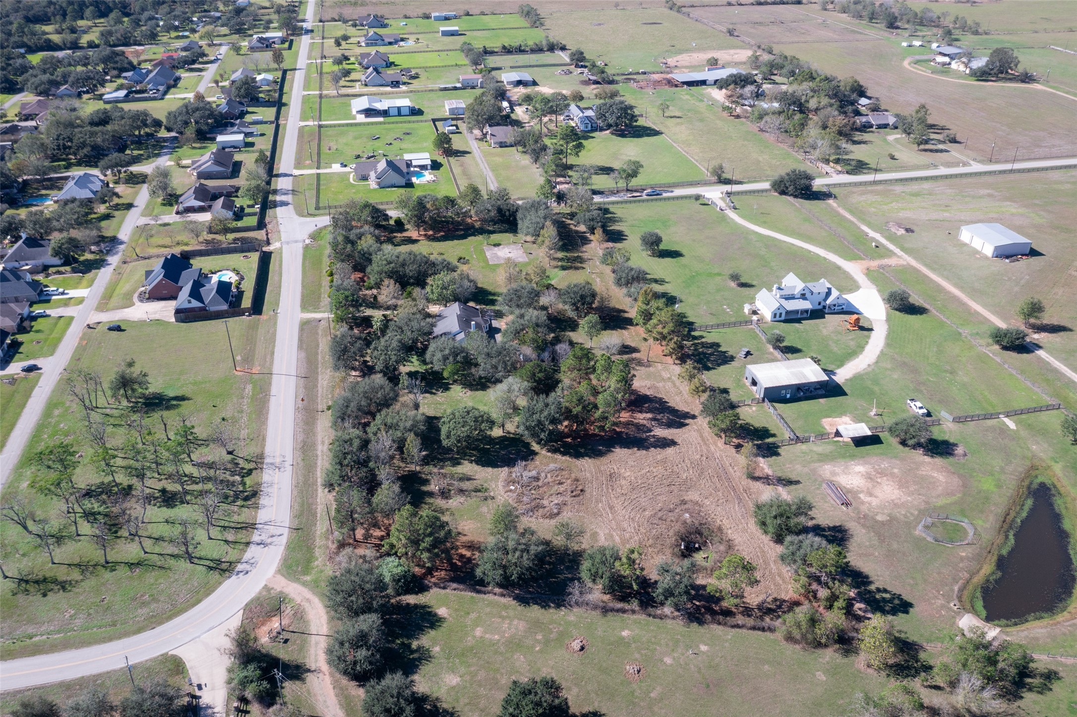 16004 Penick Road Waller, TX 77484 - Photo 49 of 50 an aerial view of residential houses with outdoor space