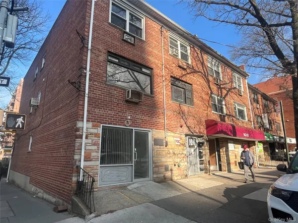 a front view of a building with street view