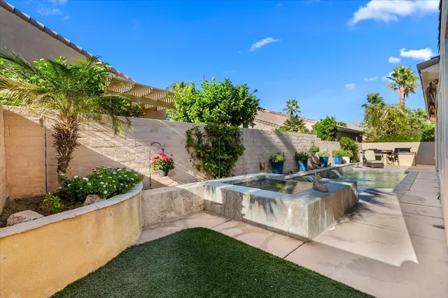 a view of outdoor kitchen and patio