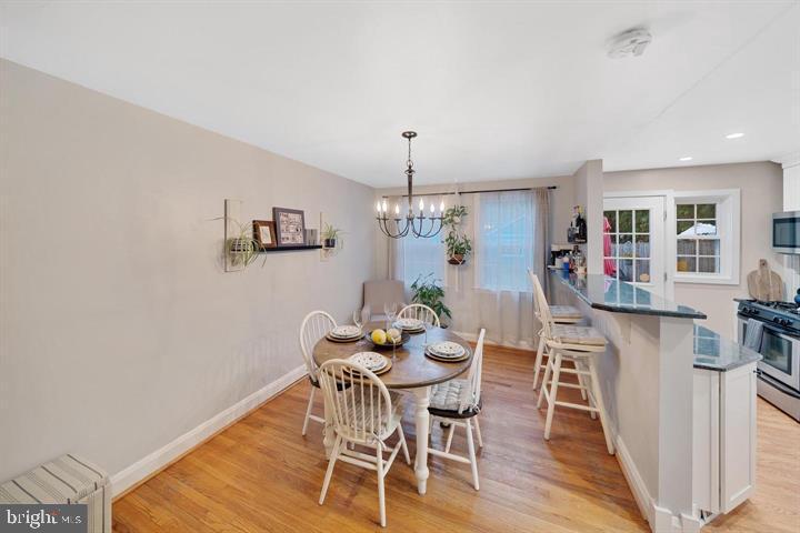 1660 Aberdeen Road Towson, MD 21286 - Photo 11 of 28 a dining room with furniture and wooden floor