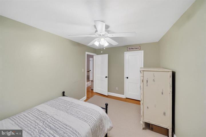 1660 Aberdeen Road Towson, MD 21286 - Photo 16 of 28 a bedroom with a bed and a ceiling fan