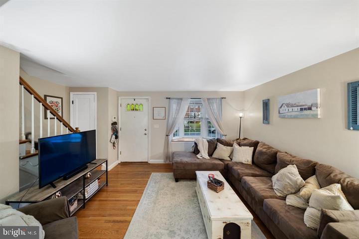 1660 Aberdeen Road Towson, MD 21286 - Photo 5 of 28 a living room with furniture a flat screen tv and a window