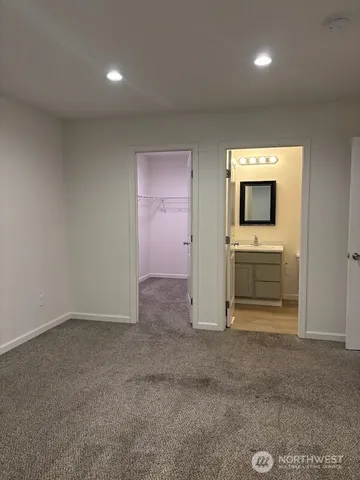 an empty room with a bathroom