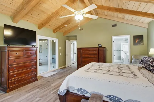 a kitchen with refrigerator cabinets and furniture