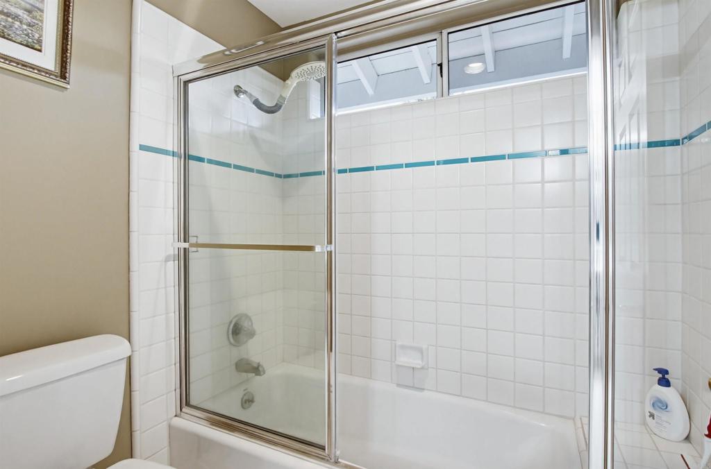 2092 Tudor Lane Fallbrook, CA 92028 - Photo 18 of 52 a bathroom with a shower and a toilet