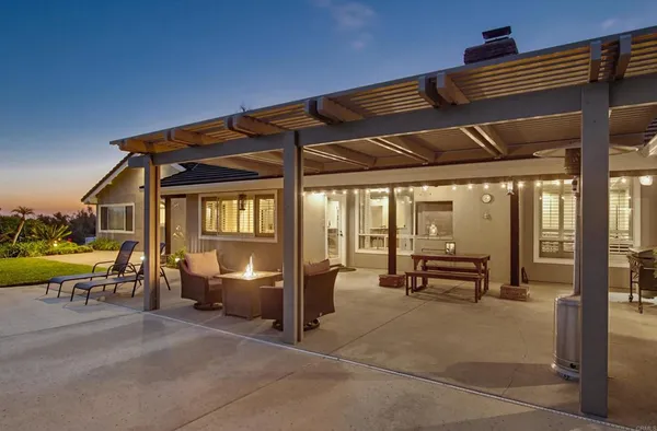 a view of a swimming pool with an outdoor space