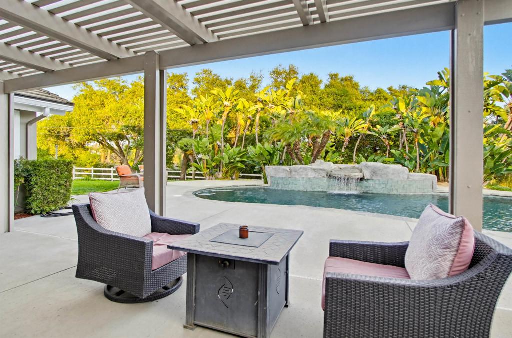 2092 Tudor Lane Fallbrook, CA 92028 - Photo 35 of 52 a living room with furniture and a window