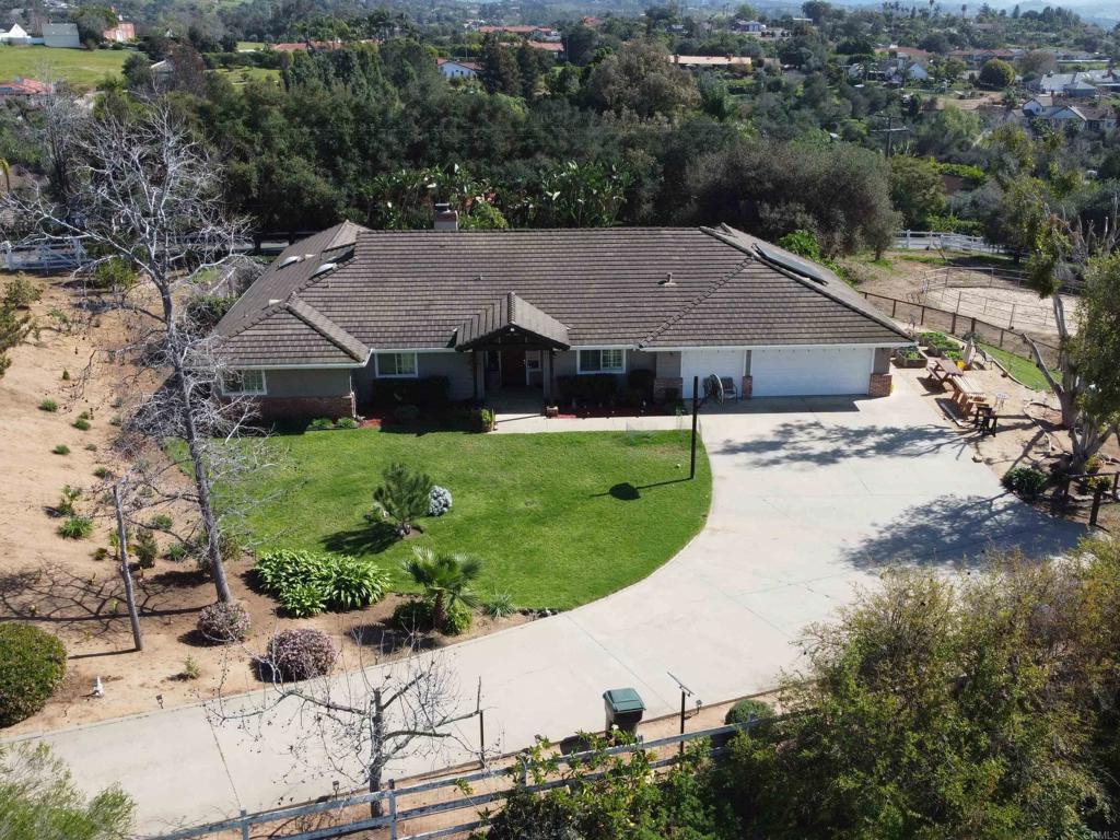2092 Tudor Lane Fallbrook, CA 92028 - Photo 44 of 52 an aerial view of a house with a yard
