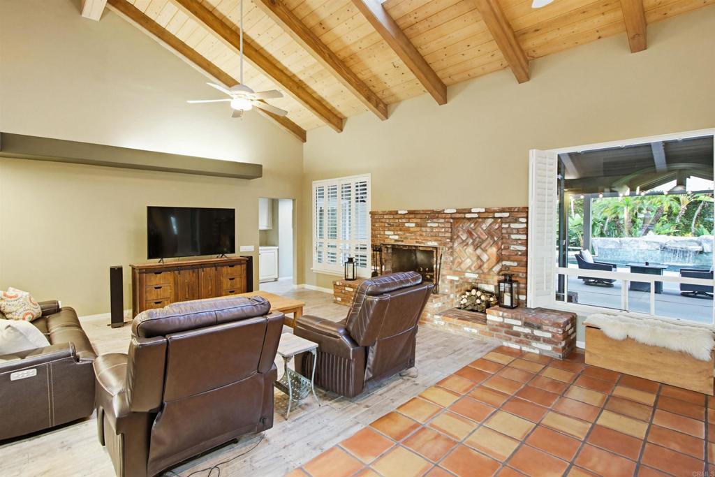 2092 Tudor Lane Fallbrook, CA 92028 - Photo 7 of 52 a living room with furniture and a flat screen tv
