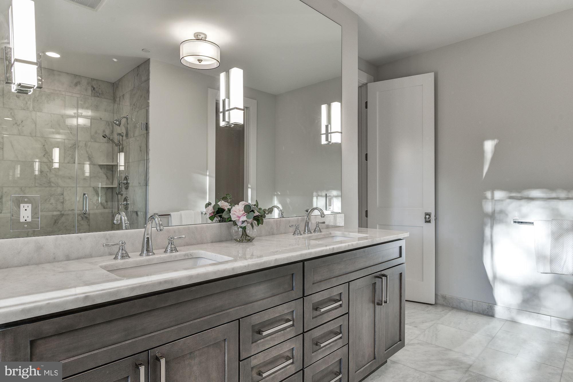 7834 Aberdeen Road Bethesda, MD 20814 - Photo 19 of 57 Master Bath with marble vanity top and flooring