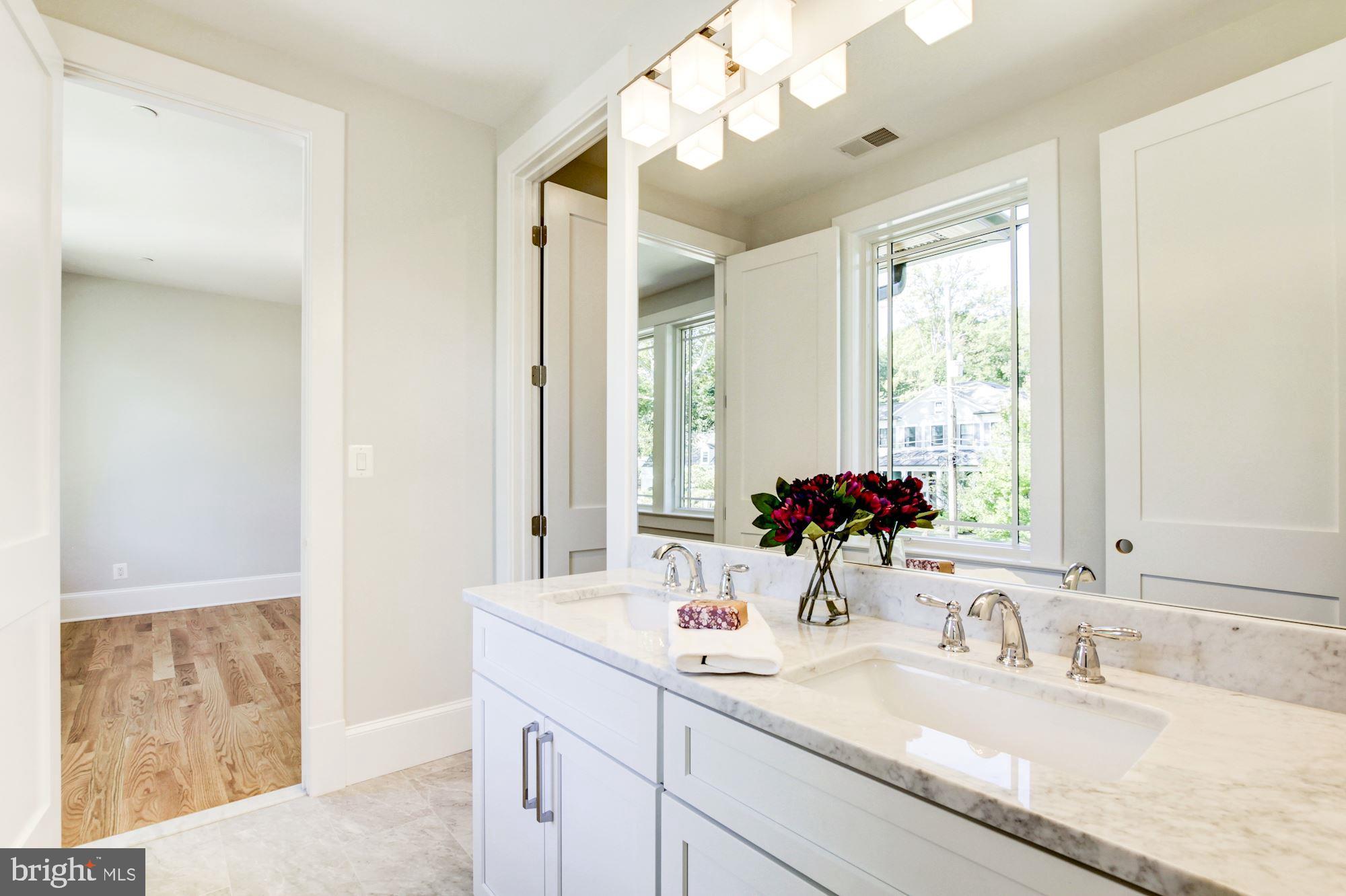 7834 Aberdeen Road Bethesda, MD 20814 - Photo 29 of 57 J & J Bath w/marble vanity top and shower