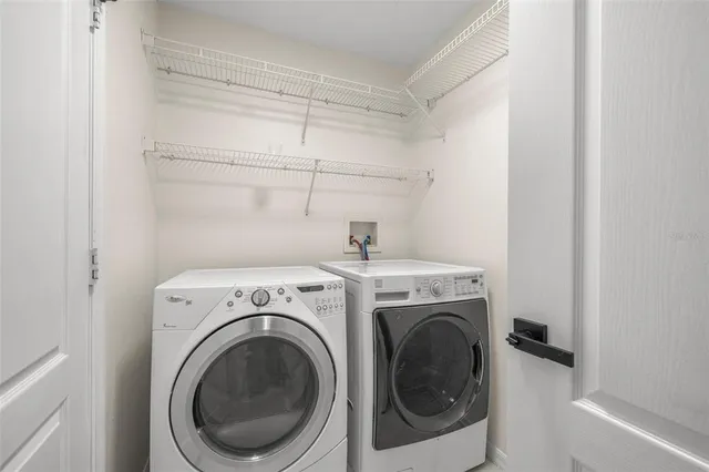 a utility room with dryer and washer