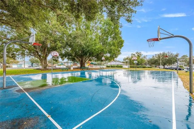 a view of a swimming pool with an outdoor space and seating area
