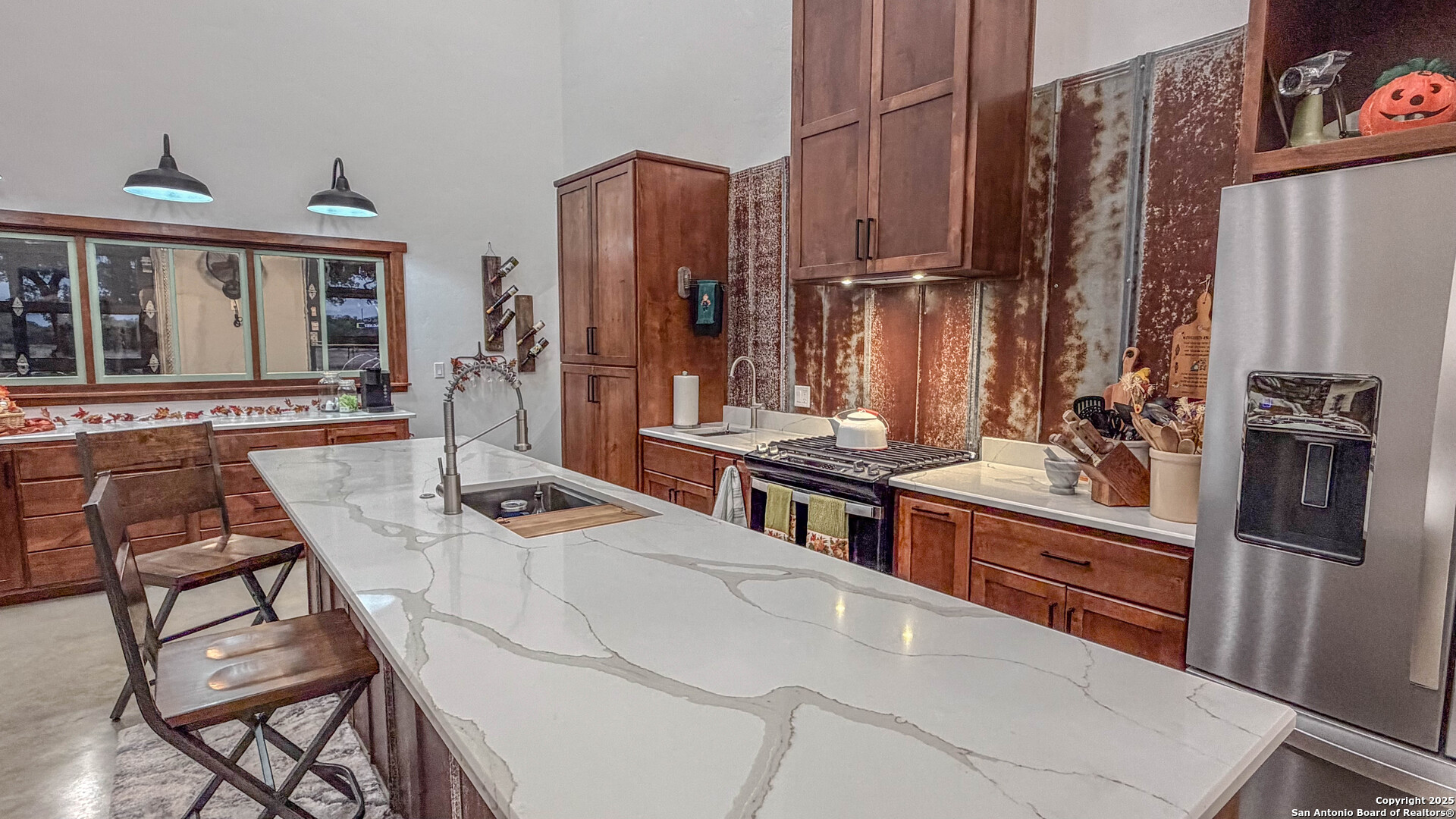 21789 Fm 2093 Harper, TX 78631 - Photo 33 of 98 a kitchen with stainless steel appliances kitchen island granite countertop a refrigerator and a stove top oven