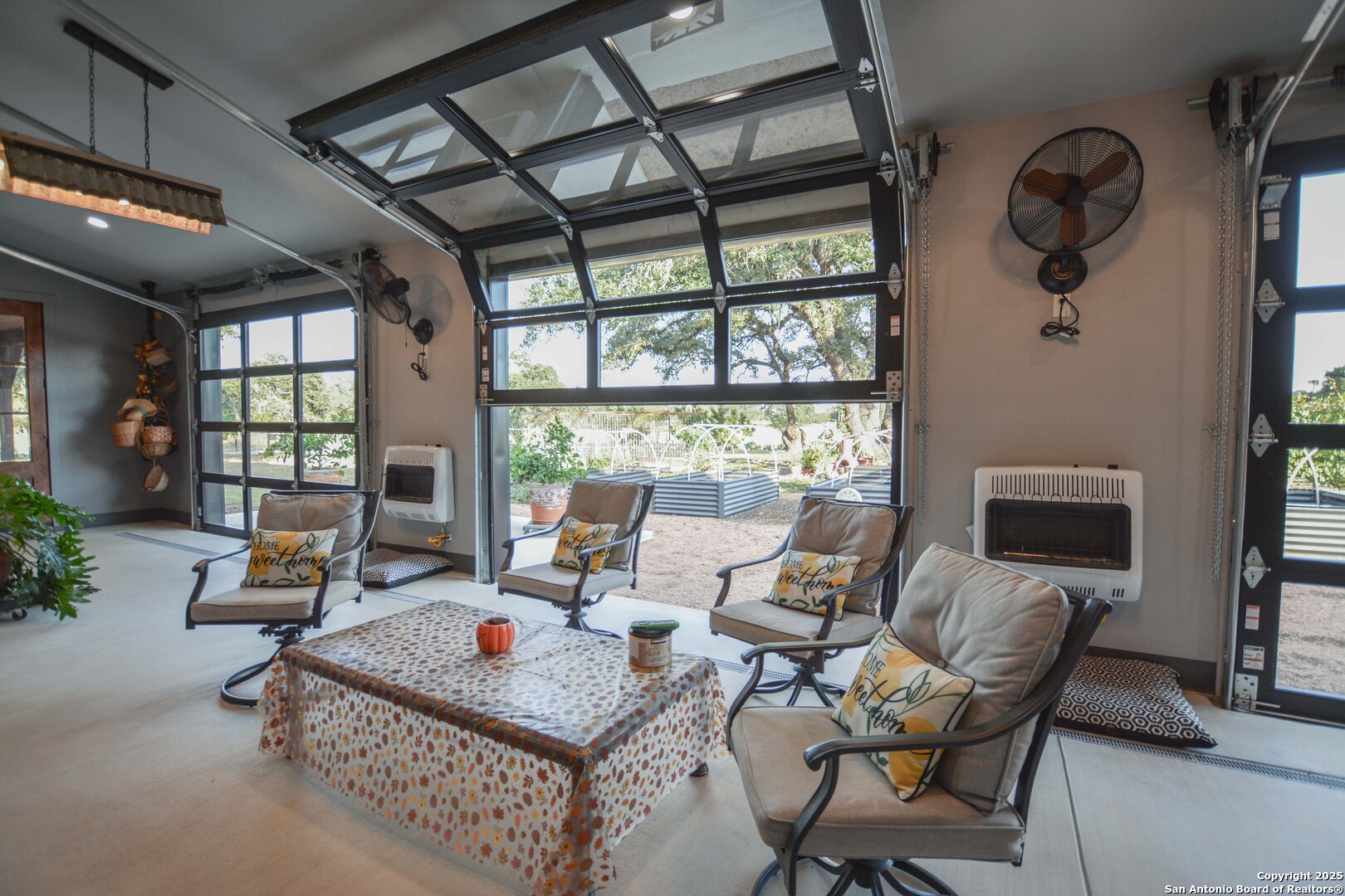 21789 Fm 2093 Harper, TX 78631 - Photo 54 of 98 a living room with patio furniture and a fireplace