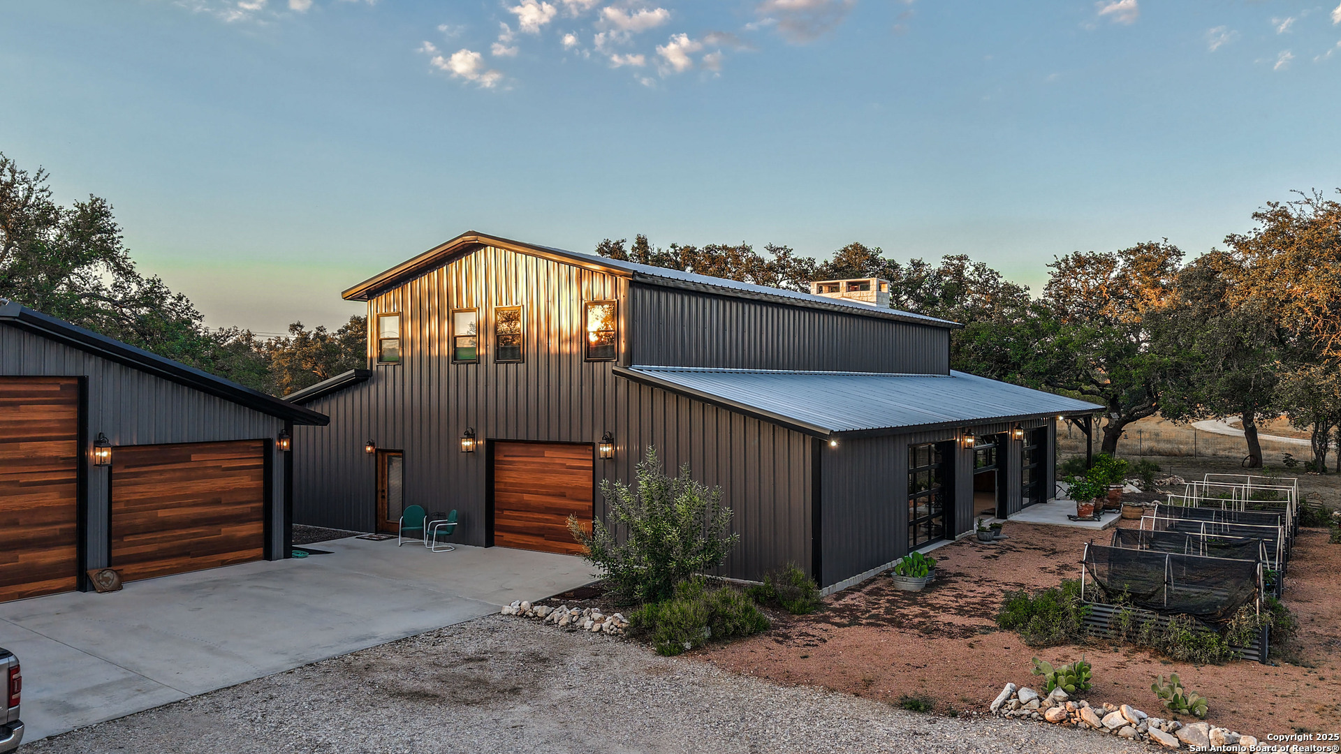 21789 Fm 2093 Harper, TX 78631 - Photo 77 of 98 a front view of a house with a yard and garage