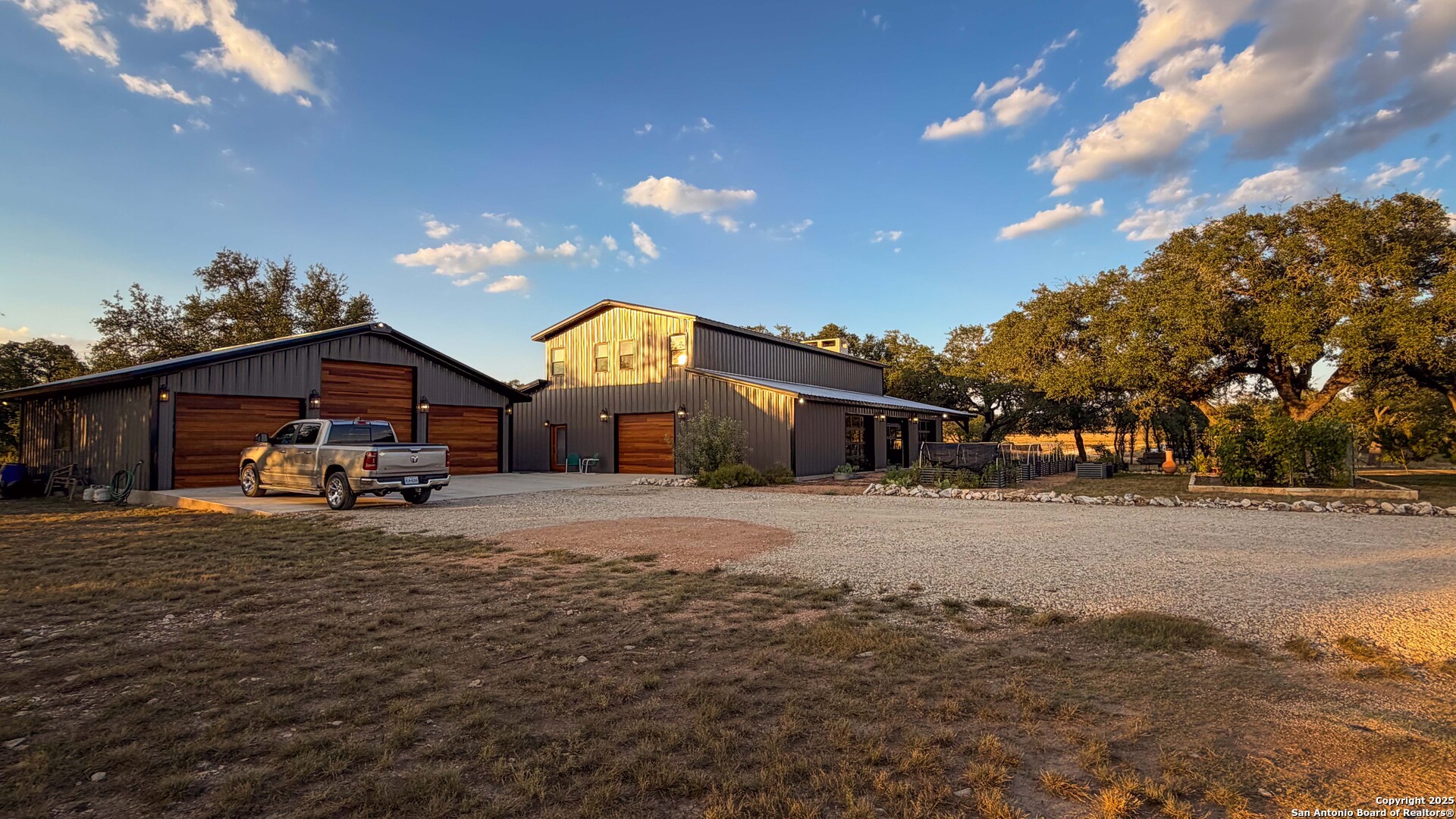 21789 Fm 2093 Harper, TX 78631 - Photo 78 of 98 a front view of a house with a yard and garage